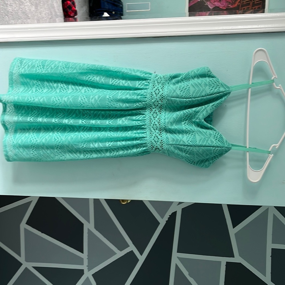 color is blueish green, no flaws, worn a couple of times